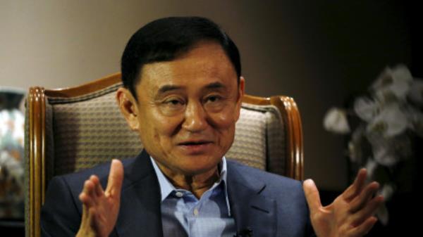 Former Thai Prime Minister Thaksin Shinawatra speaks to Reuters during an interview in Singapore February 23, 2016. REUTERS/Edgar Su