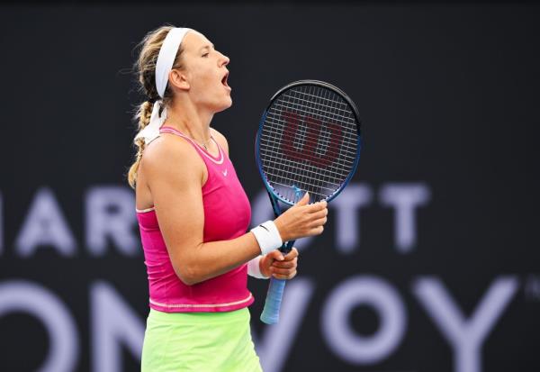 Victoria Azarenka celebrates win over Jelena Ostapenko.
