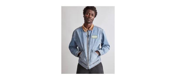 a man wearing a jean jacket