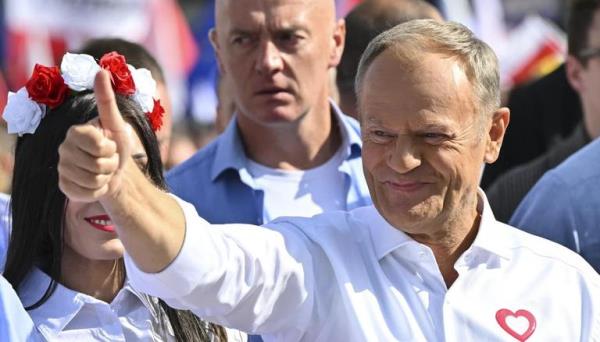 Polish opposition leader Do<em></em>nald Tusk says change ‘is inevitable’ as election supporters rally