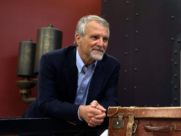 Paul-Henri Nargeolet poses inside an exhibition dedicated to the Titanic at 'Paris Expo' on May 31, 2013, in Paris. 