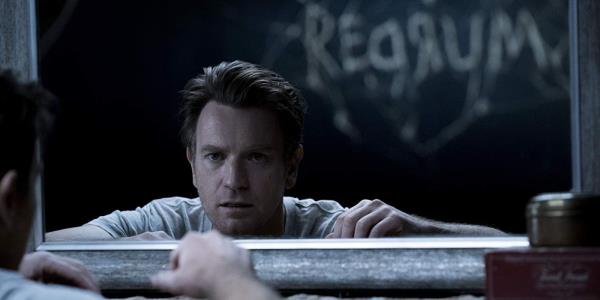 Ewan McGregor in Doctor Sleep with REDRUM writing