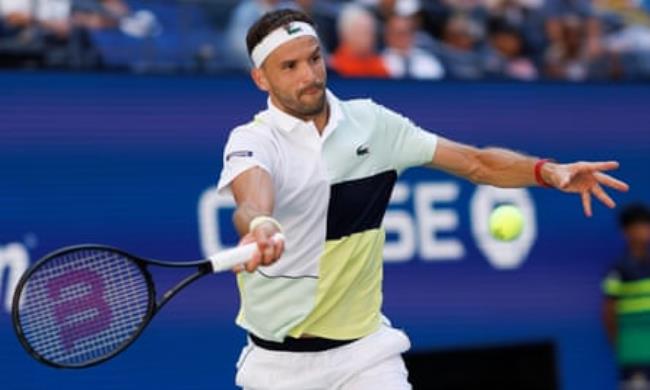 Grigor Dimitrov plays a shot during his victory